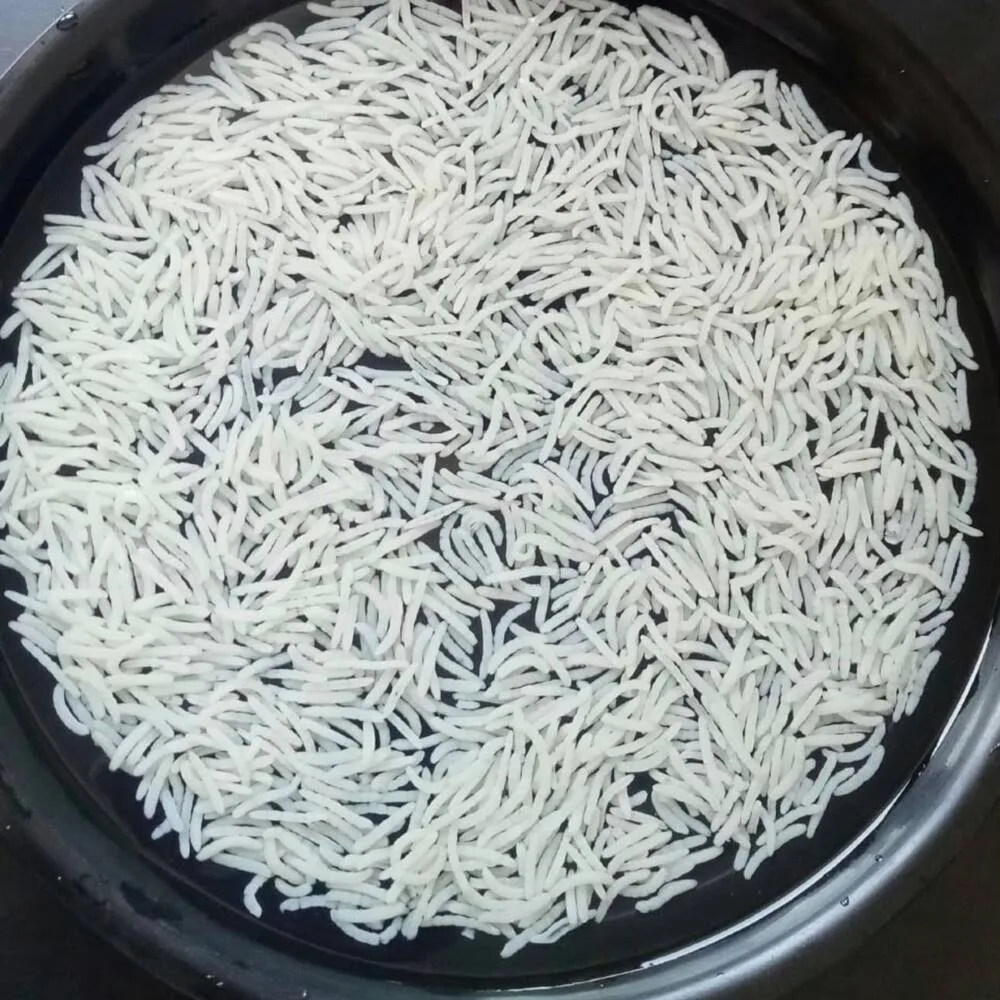 Cooked basmati rice in a black pot after a cooking test